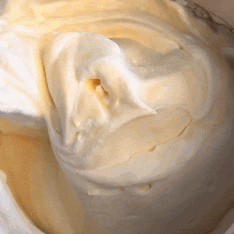 Jocelyn Delk Adams making the ice cream batter and folding in the pecan pie swirl